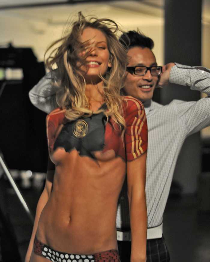 Sarah Brandner (with photographer Yu Tsai) in body paint, SI Swimsuit 2010